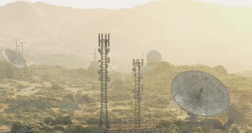 Global Communication Towers and Satellite Dishes in Desert Landscape