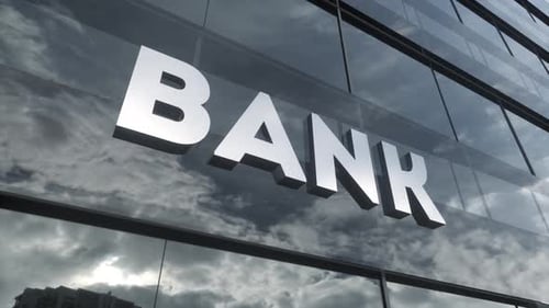 Bank Sign on Glass Building