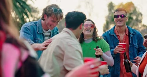 Friends Laughing and Celebrating Together Outdoors