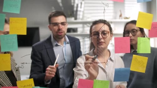 Office Team Collaborating on Business Growth Chart