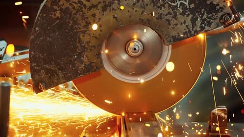 Metal Chop Saw Cutting Metal with Sparks