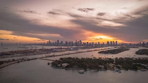 Downtown Miami, Florida with Boats and traffic sunset