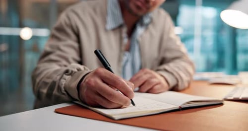 Hands, man or writing in notebook in office for article planning, story research or news schedule