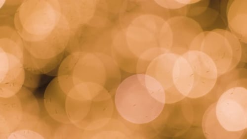 Golden Abstract Bokeh Background with Blurred Lights