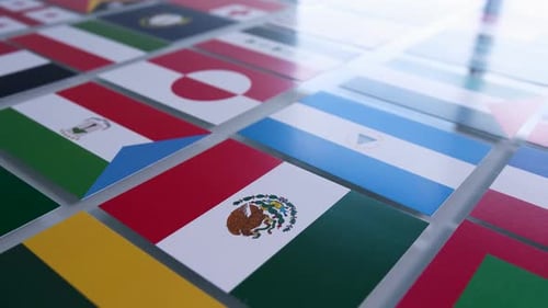 Array of Colorful International Flags on White Surface