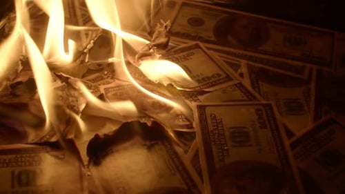 US Dollars Engulfed in Fire