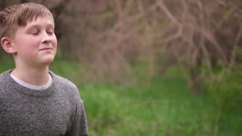 Closeup Portrait of Teenage Boy Showing Emotions and Having Fun in City Park Kid Boy Outdoors