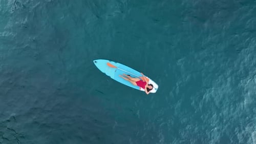 Aerial View Paddleboarding in a Tranquil Mediterranean Lagoon Calm and Scenic Surroundings
