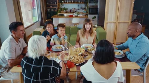 Family and Friends Having Lunch Together Indoors