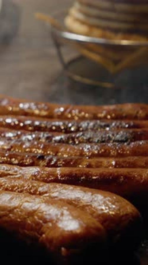 Sausages Sizzle on a Flat Top Grill