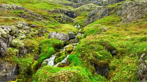 Wispy Waterfalls Flowing Over Cliff Mountain River Forms Many Small Waterfalls Summer Landscape in