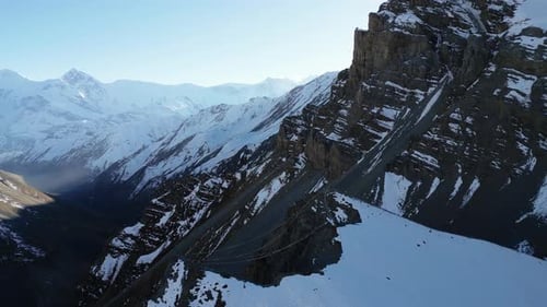 Aerial View of Snow-Capped Mountains in Winter