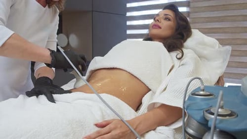 Woman Receives Medical Massage in Aesthetician's Office