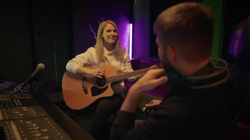 Audition in Recording Studio Talented Lady Guitarist Singing Song and Playing Musical Producer Man