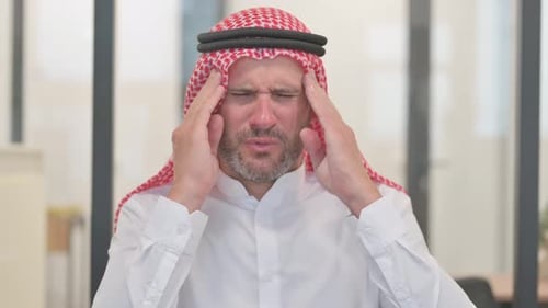 Portrait of Brainstorming Arab Man Sitting Thoughtful