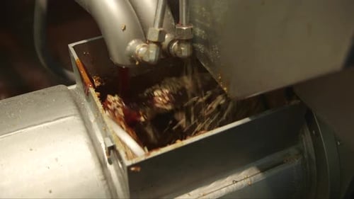 different ingredients are added in a mixer in a chocolate factory