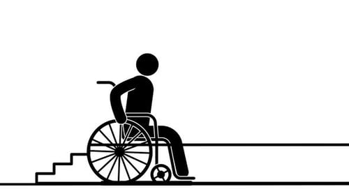 Wheelchair overcoming stairs with the help of a special lift