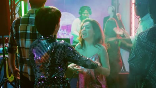 Romantic Couples Dancing in Pairs at Party