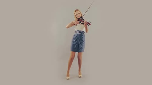 Woman Playing Violin in Studio