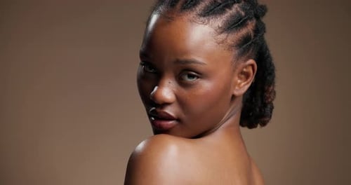 Beauty, face and shoulder with black woman in studio for skincare, body care and glow