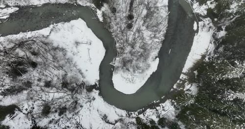 Overhead Aerial Of Windy River Bend Meander Meandering Curves In Winter Snow Beautiful Nature