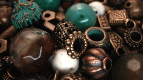 Close-up View of a Pile of Colorful Vintage Beads and Ornaments