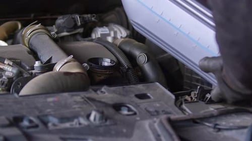 Adding Oil to Car Engine