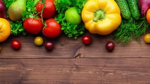 Colorful Fresh Vegetables and Fruits on Rustic Table