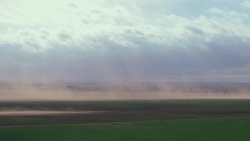 Sweeping Dust Storm Over Oklahoma Highway in Wide Open Rural Landscape