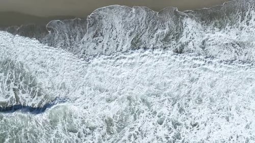 Beautiful Sandy Beach in a Strong Storm White Waves are Beating on the Beach Vertical Video