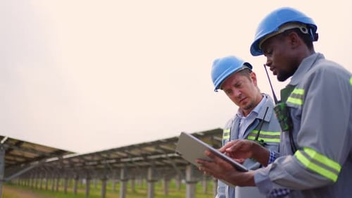 Professional engineer work to maintenance of photovoltaic panel system.