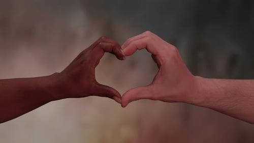 Hands Coming Together to Form a Heart Shape Symbolizing Love Unity and Togetherness