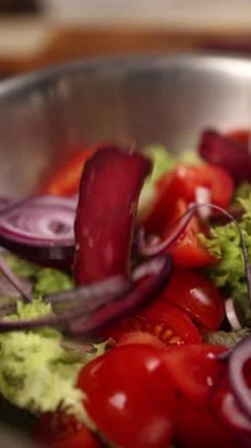 Chef prepares a delicious salad in a restaurant