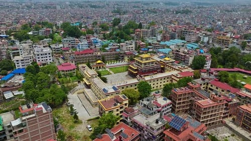 Shechen Monastery With Cityscape In Tushal-Mahankal Road, Kathmandu, Nepal. Aerial Wide Shot
