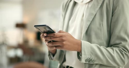 Woman, phone and hands typing for social media, communication or networking at office