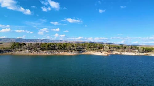 A beautiful forest and a lake view next to it