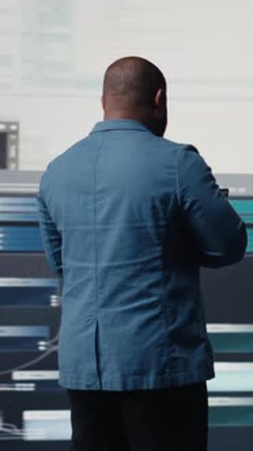 Vertical Video African American Coder Expert Immersing in Software Development