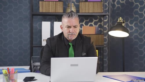 Businessman working with focus serious.