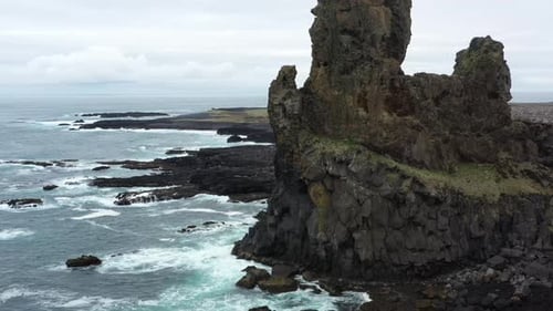 Dramatic Cliffs and Ocean Waves in Iceland
