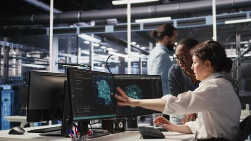 Data Center Technicians Adjusting Blade Server Hardware Powering AI