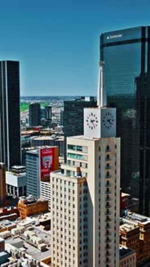 Aerial view of Dallas skyline featuring iconic buildings and landscape
