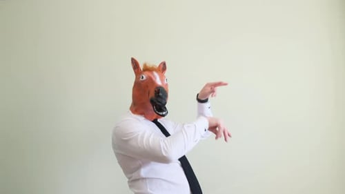 Man Wearing Horse Head Mask Dancing Silly
