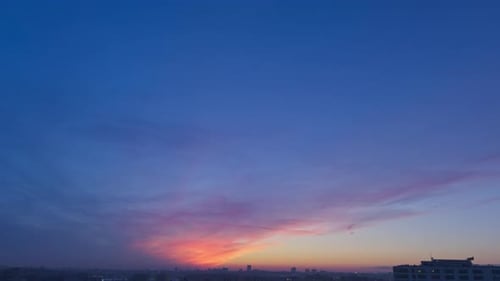 Colorful Sky At Sunset In Warsaw, Poland - Tilt Down Shot