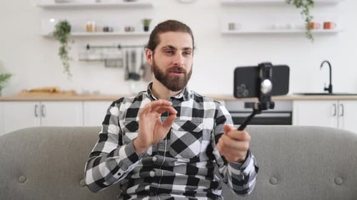 Young Adult Man Video Chatting on Phone