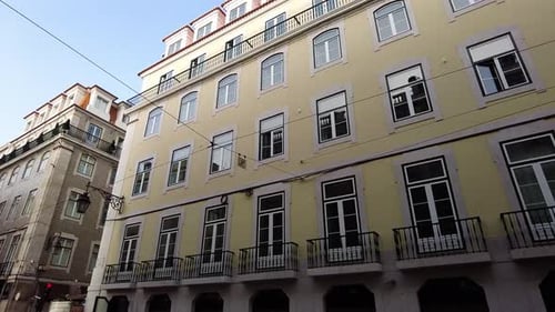 Typical Building Facade In Lisbon Downtown, Portugal. Low Angle Shot