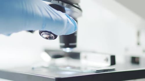 Closeup of Scientific Microscope Laboratory in Hospital Epidemic Disease Healthcare Vaccine Research