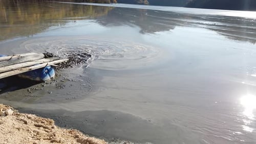 Mining Residuals Flowing into Decanting Pond From a Copper Mine. Geamana, Rosia Montana, Romania