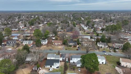 American neighborhood homes and buildings in suburb. Different built houses in scenic area. Aerial t
