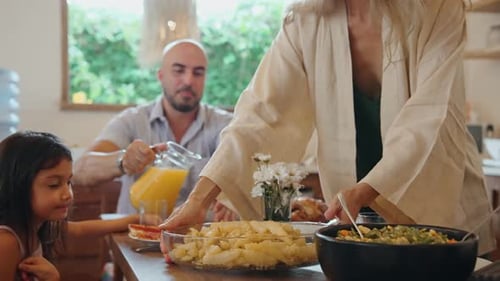 Family Gathering for Meal at Home