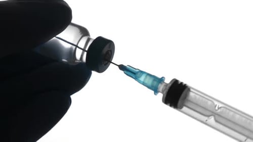 Doctor Injecting Vaccine